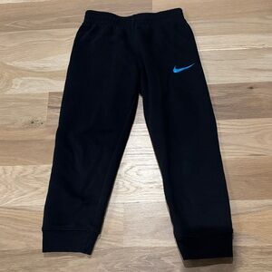 Nike Kids Black Joggers with Blue Swoosh